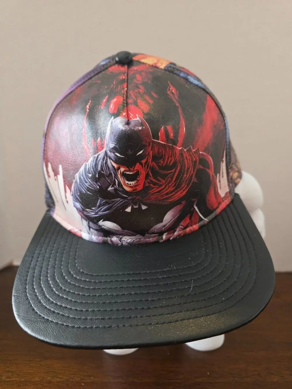 Bioworld Batman snapback hat features a sublimated comic book scene print